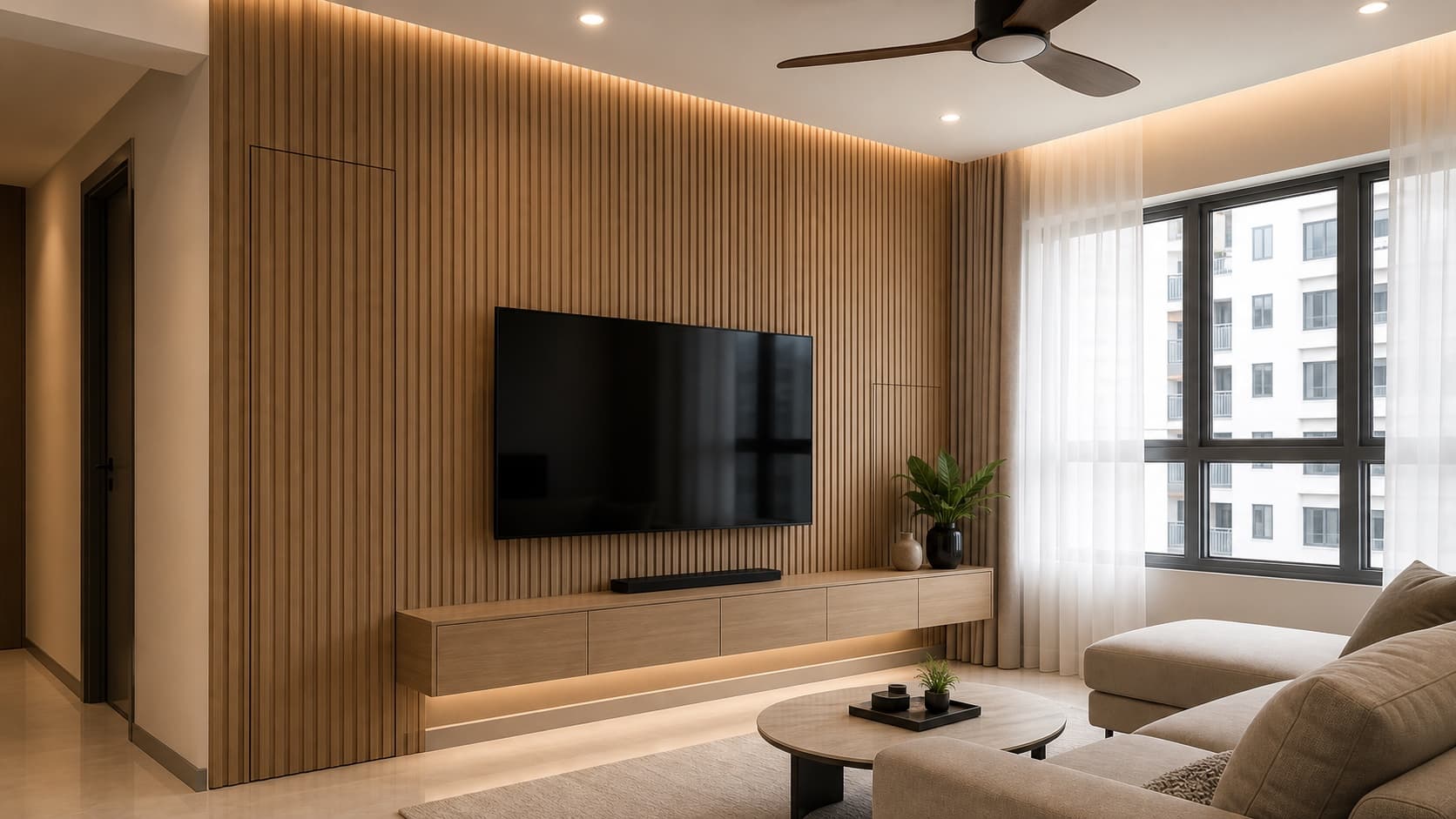 Fluted timber panel television wall in a compact Singapore HDB living room